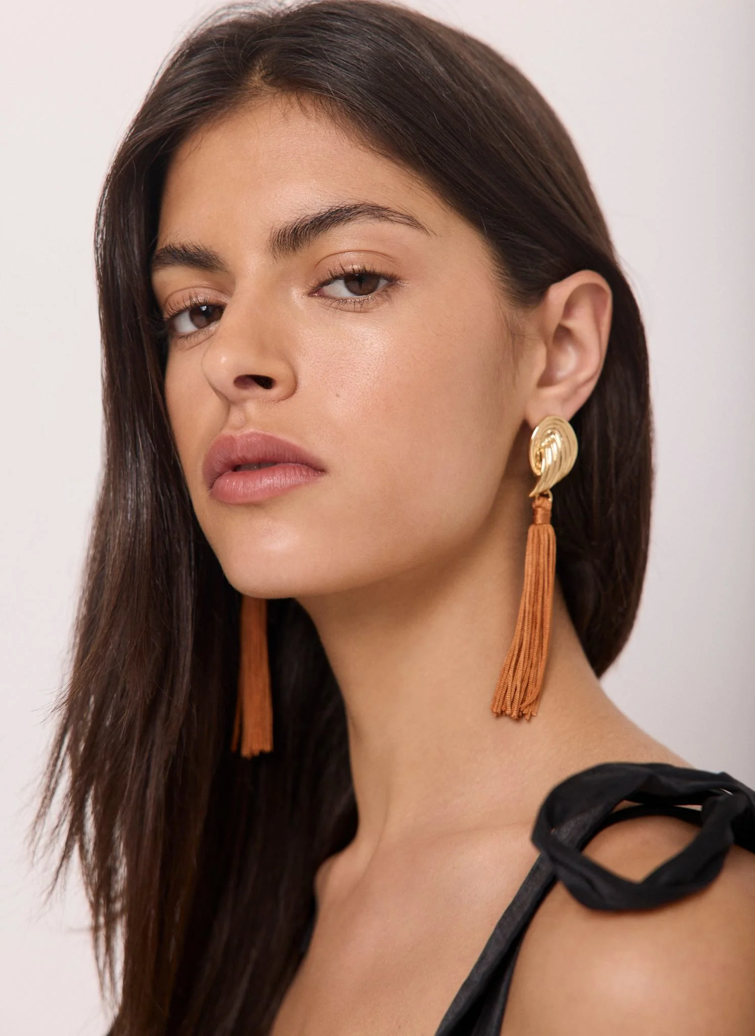 Gold Tone Ridged Wing Tassel Earrings - Image 2